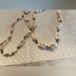 32” shell necklace.
